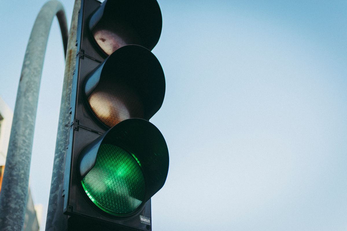 A traffic light showing green